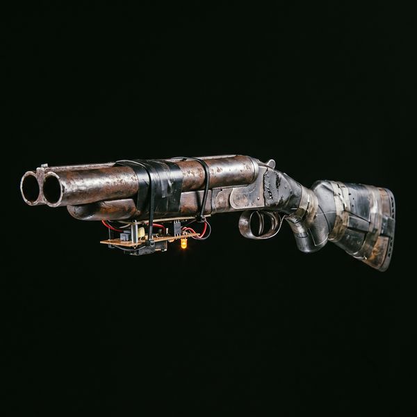 Rusted sawn-off shotgun on a taped stock