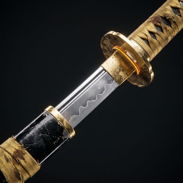 Katana with a tarnished gold guard